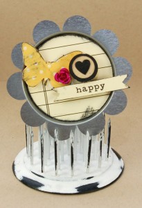 altered metal bottle cap with butterfly, flower, and text saying happy
